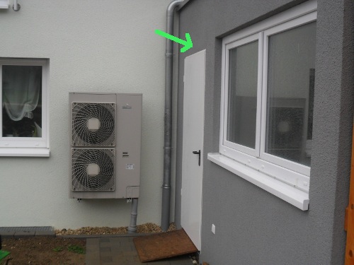 Pic of Heat pump fan behind door