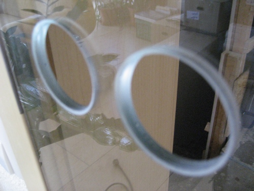 Pic of glass door with 2 holes